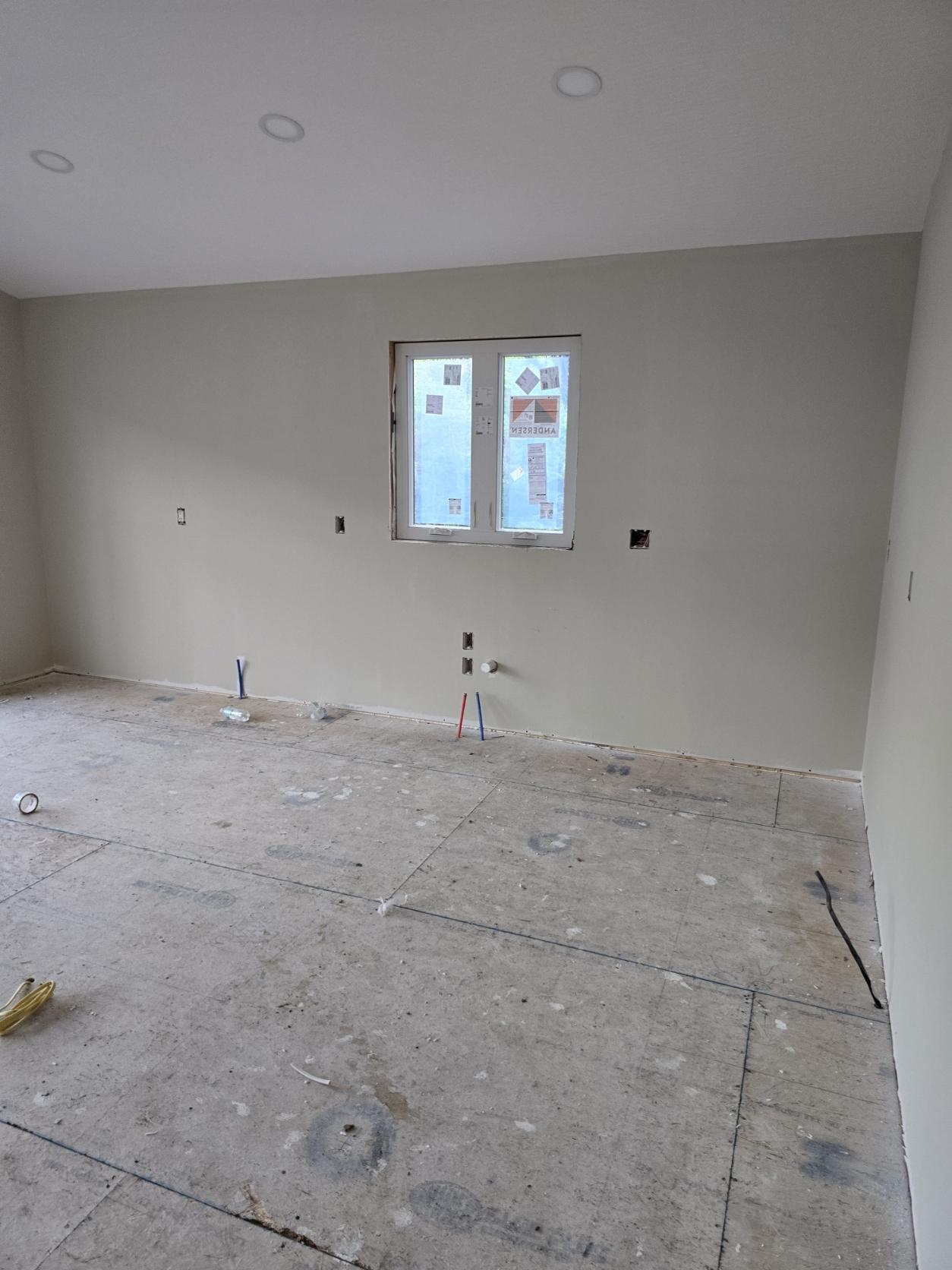 Kitchen area during construction with plumbing rough-ins in Glouster Ohio home build
