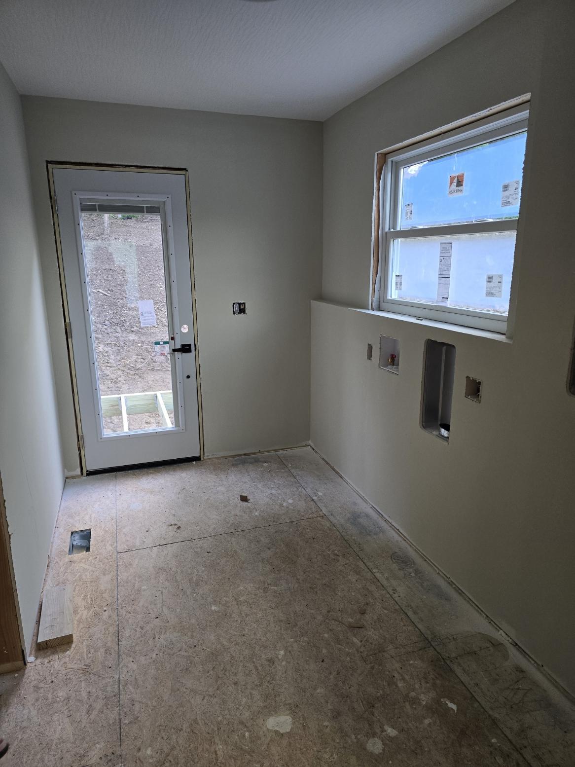Mudroom or laundry room area under construction in Glouster Ohio home